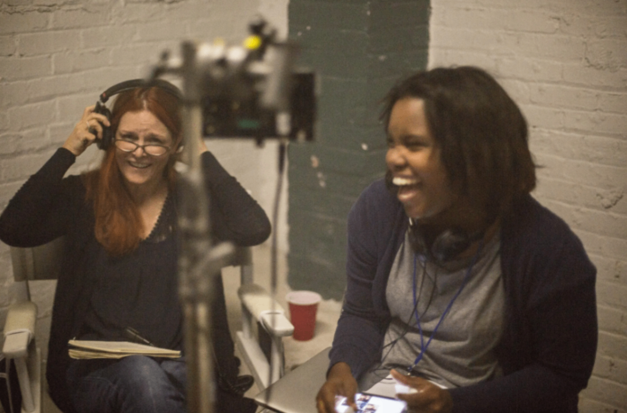 Anne Welles and Sabrina laughing on set