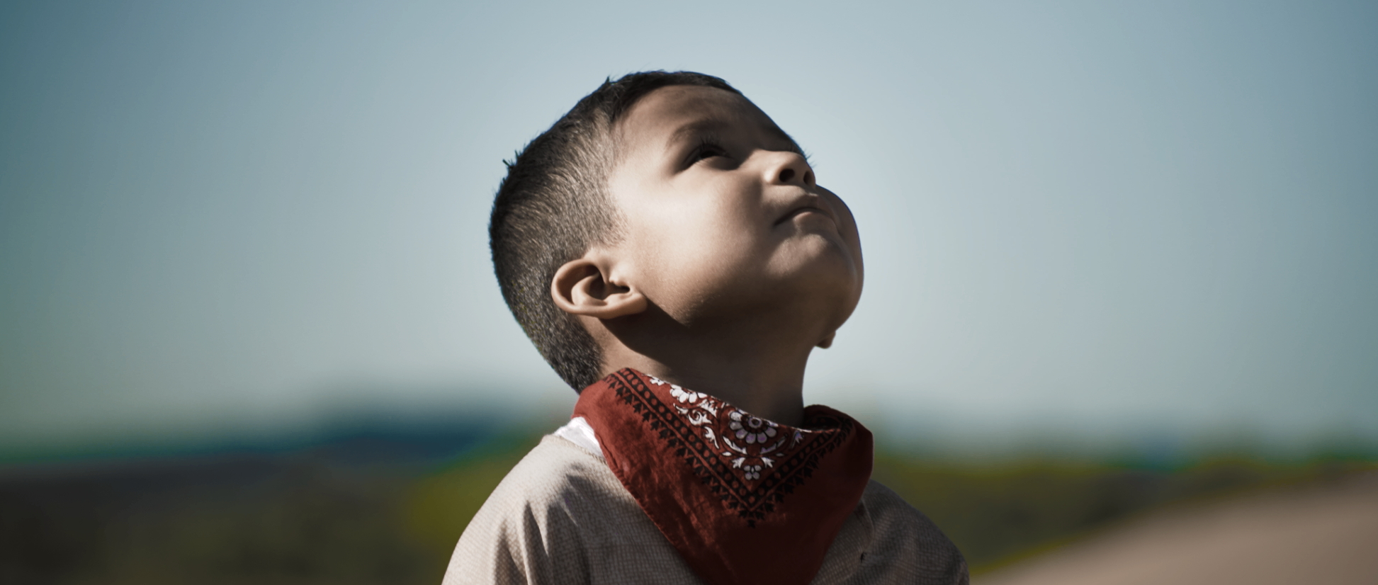 Boy looks up — music video still