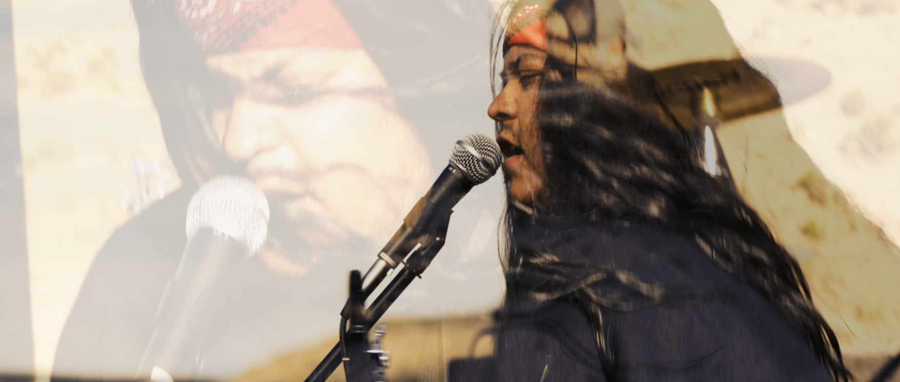 Lead singer Kyle performing — music video still